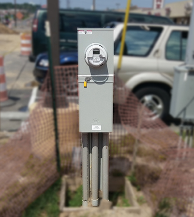 A Milbank U6221 meter main pedestal providing power distribution for traffic lights and signals in Maryland.